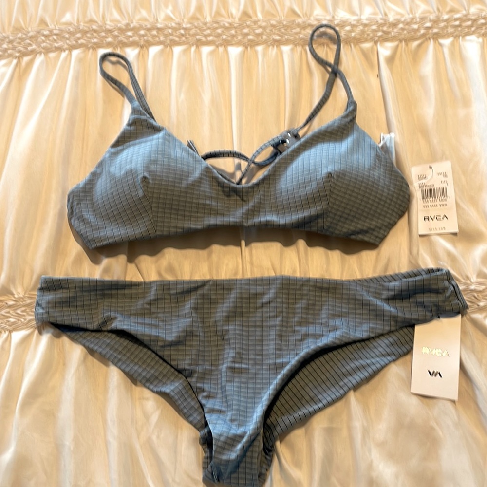 Never worn! Periwinkle RVCA bikini. NOTE: Small top/large bottom.